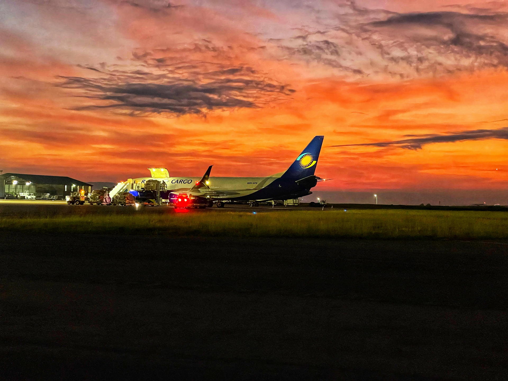 RwandAir Cargo loading at stunning sunset