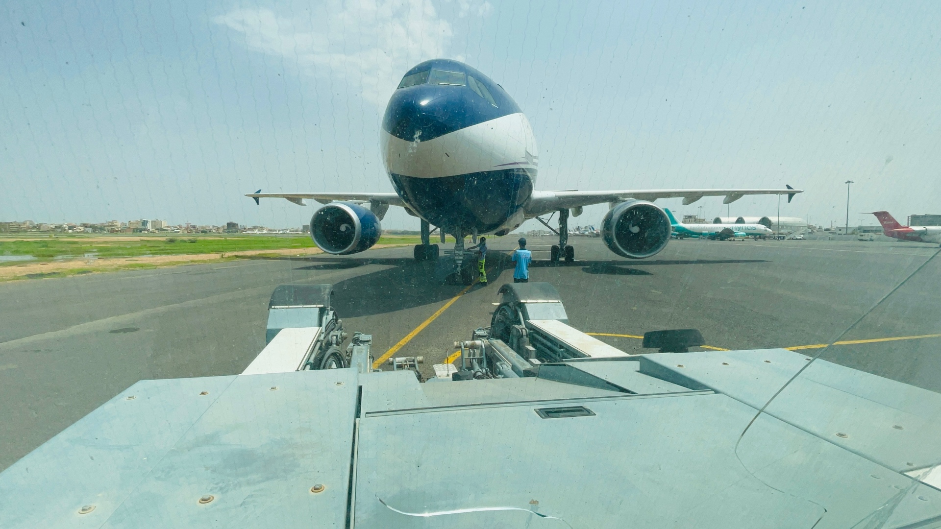 Widebody aircraft frontal view on tarmac