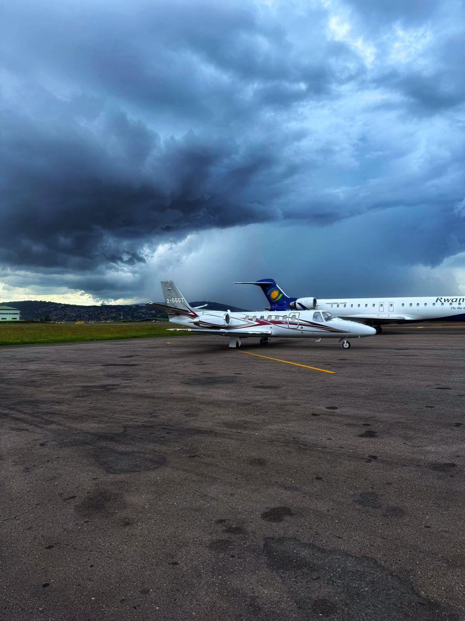 Private jet under dramatic skies in Rwanda